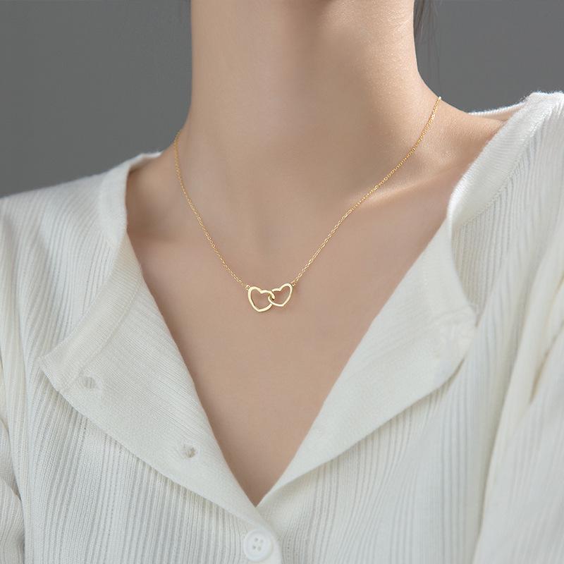 Collier coeurs enlacés, bijou en acier inoxydable doré