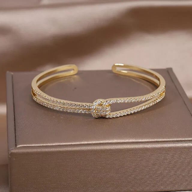 Bracelet Noeud, bijou en alliage plaqué or et en zircons naturels