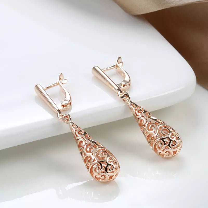 Boucles d'oreilles gouttes et arabesques ajourées, bijou en plaqué or rose 585 (14 carats)