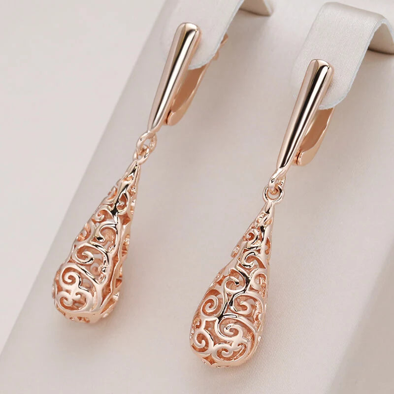 Boucles d'oreilles gouttes et arabesques ajourées, bijou en plaqué or rose 585 (14 carats)