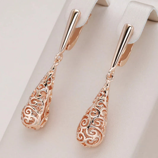 Boucles d'oreilles gouttes et arabesques ajourées, bijou en plaqué or rose 585 (14 carats)