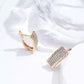 Boucles d'oreilles pavés de zircons, bijou en plaqué or rose et en zircons naturels