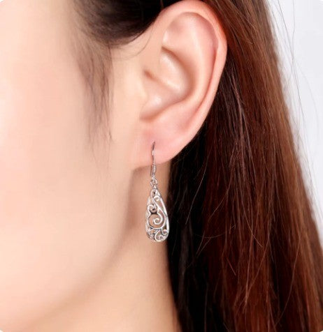 Boucles d'oreilles arabesques ajourées, bijou en plaqué argent