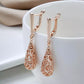 Boucles d'oreilles gouttes et arabesques ajourées, bijou en plaqué or rose 585 (14 carats)