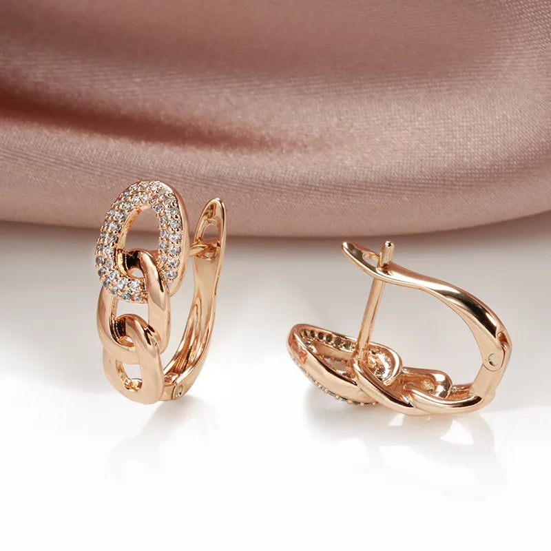 Boucles d'oreilles trois maillons, bijou en plaqué or rose et en zircons naturels