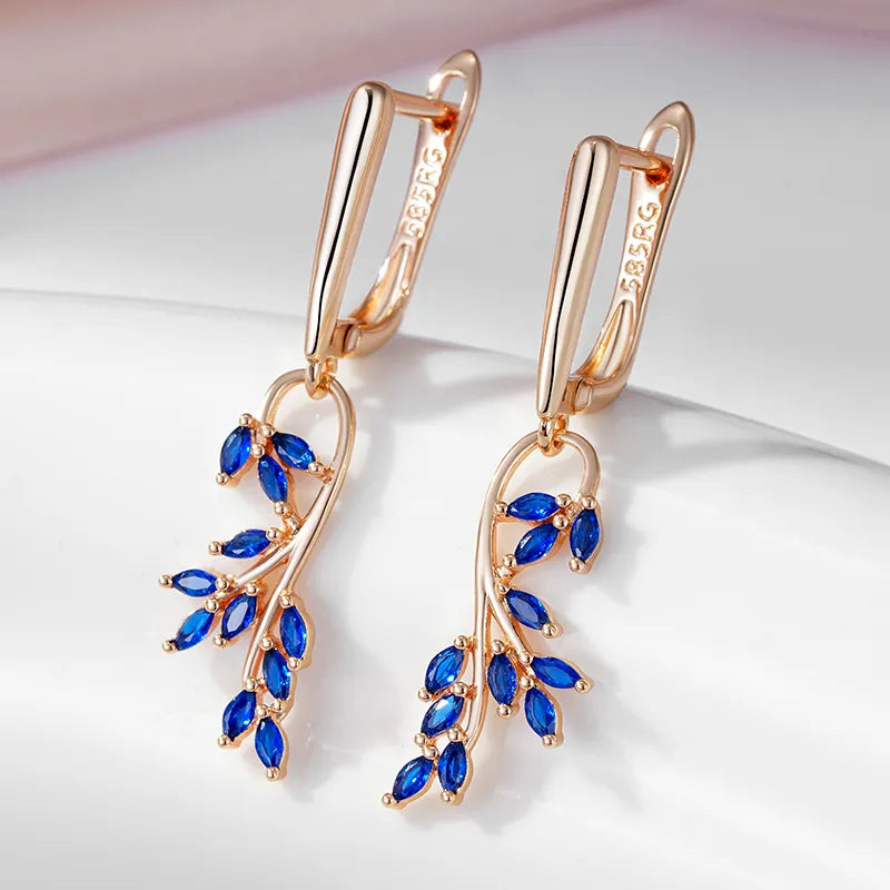 Boucles d'oreilles Fleurs bleues, bijou en plaqué or rose et en zircons naturels
