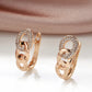 Boucles d'oreilles trois maillons, bijou en plaqué or rose et en zircons naturels