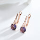Boucles d'oreilles Zircons mauves, bijou en alliage plaqué or rose 585 (14 carats) et en zircons naturels