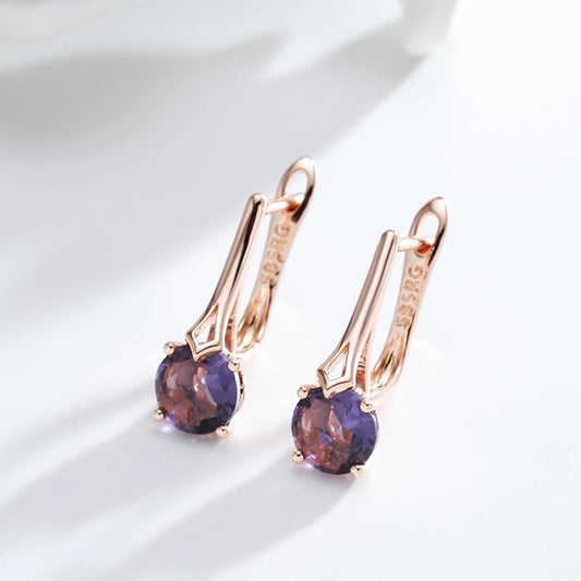 Boucles d'oreilles Zircons mauves, bijou en alliage plaqué or rose 585 (14 carats) et en zircons naturels