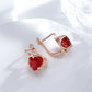 Boucles d'oreilles zircons facettés rouges, bijou en plaqué or rose 585 (14 carats) et en zircons naturels