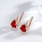 Boucles d'oreilles zircons facettés rouges, bijou en plaqué or rose 585 (14 carats) et en zircons naturels