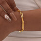 Bracelet trombone, bijou en acier inoxydable doré