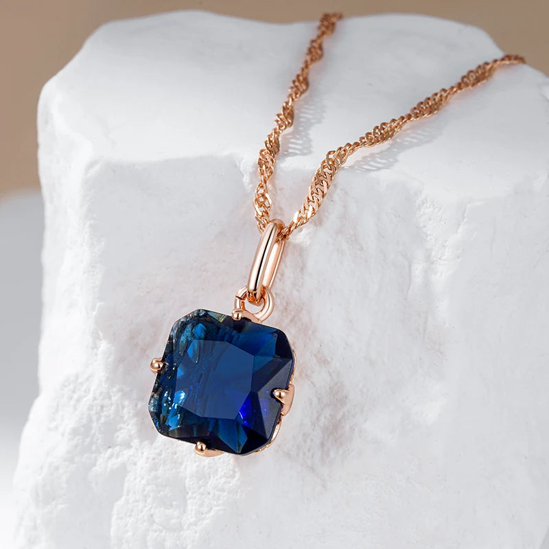 Collier pendentif pierre bleue, bijou en plaqué or rose 585 (14 carats) et en zircon naturel