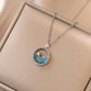 collier baleine avec cristal bleu