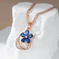Collier Fleur bleue, bijou en alliage plaqué or 585 (14 carats) et en zircons naturels