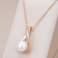 Collier pendentif perle nacrée, chaîne forçat, bijou en acrylique et en plaqué or rose
