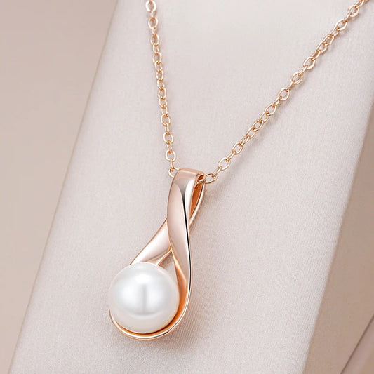 Collier pendentif perle nacrée, chaîne forçat, bijou en acrylique et en plaqué or rose