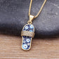 collier avec pendentif slash avec motif oeil turc et zircons