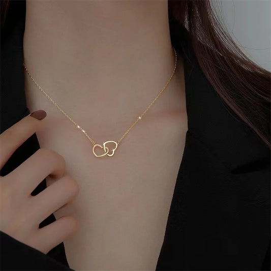 Collier coeurs enlacés, bijou en acier inoxydable doré