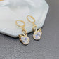 Boucles d'oreilles Cygnes blancs, bijou en alliage plaqué or 585 (14 ct) et en zircons naturels