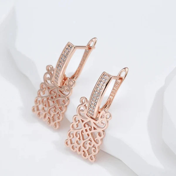 boucles d'oreilles exotiques arabesques et zircons blancs 