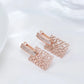 boucles d'oreilles arabesques en plaqué or rose