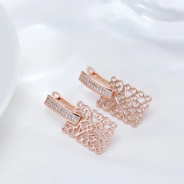 boucles d'oreilles arabesques en plaqué or rose