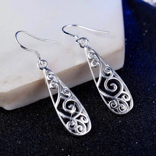 Boucles d'oreilles arabesques ajourées, bijou en plaqué argent