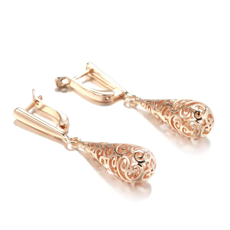 Boucles d'oreilles gouttes et arabesques ajourées, bijou en plaqué or rose 585 (14 carats)