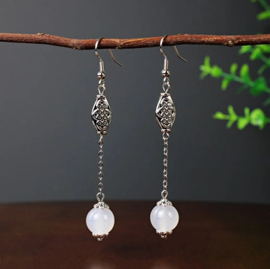 Boucles d'oreilles pendantes Perles Oeil de chat blanches, bijou en acier inoxydable