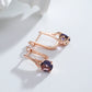 Boucles d'oreilles Zircons mauves, bijou en alliage plaqué or rose 585 (14 carats) et en zircons naturels