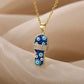 Collier sandale oeil turc, maille forçat, bijou en plaqué or, en émail et en zircons naturels