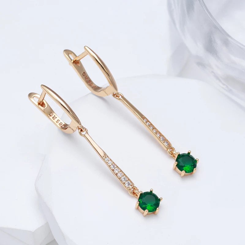 Boucles d'oreilles pendantes zircons verts, bijou en plaqué or rose 585 (14 carats) et en zircons naturels