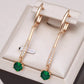 Boucles d'oreilles pendantes zircons verts, bijou en plaqué or rose 585 (14 carats) et en zircons naturels