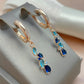 Boucles d'oreilles Zircons bleus, bijou en plaqué or rose et en zircons naturels