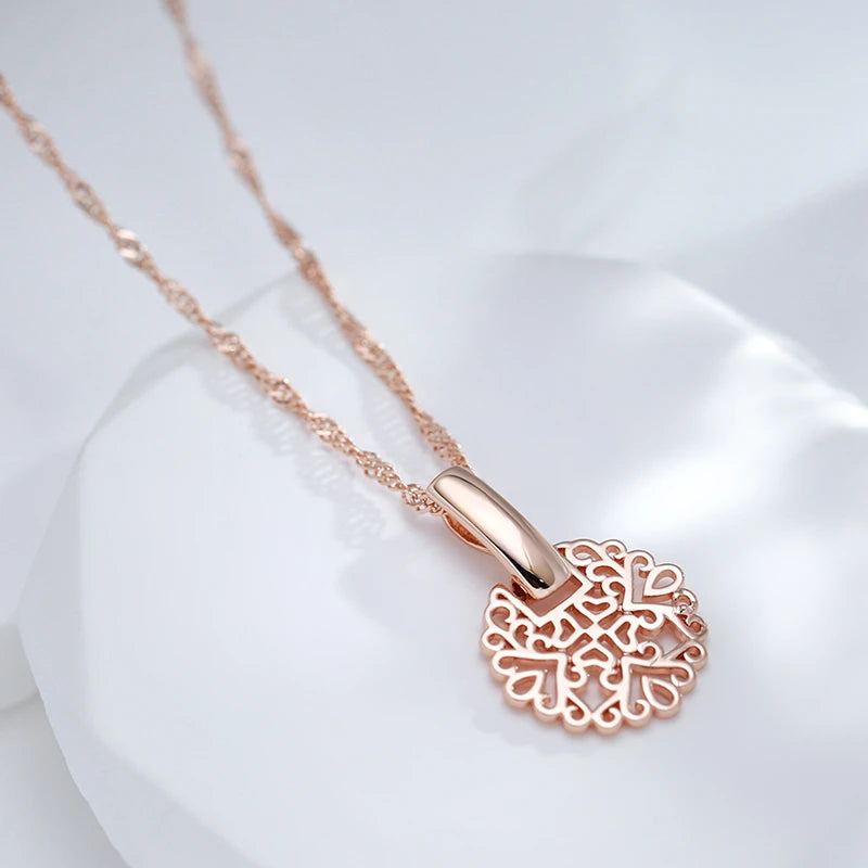 Collier pendentif disque d'arabesques ajourées, bijou en plaqué or rose 585 (14 carats)