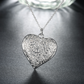 Collier Coeur ajouré et fleuri, bijou en alliage plaqué argent