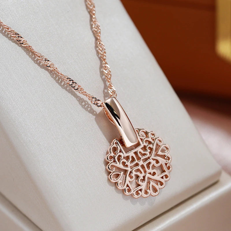 Collier pendentif disque d'arabesques ajourées, bijou en plaqué or rose 585 (14 carats)