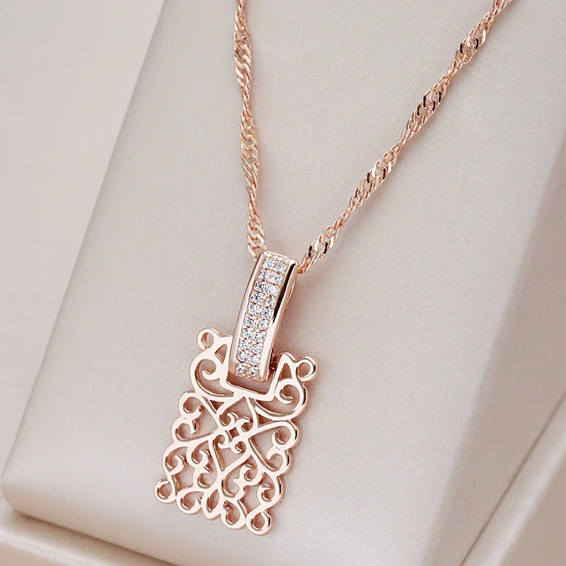 Collier avec motif d'arabesques et zircons, bijou en plaqué or rose 585 (14 carats) et en zircons naturels