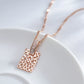 Collier avec motif d'arabesques et zircons, bijou en plaqué or rose 585 (14 carats) et en zircons naturels