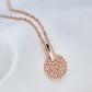 Collier pendentif disque d'arabesques ajourées, bijou en plaqué or rose 585 (14 carats)