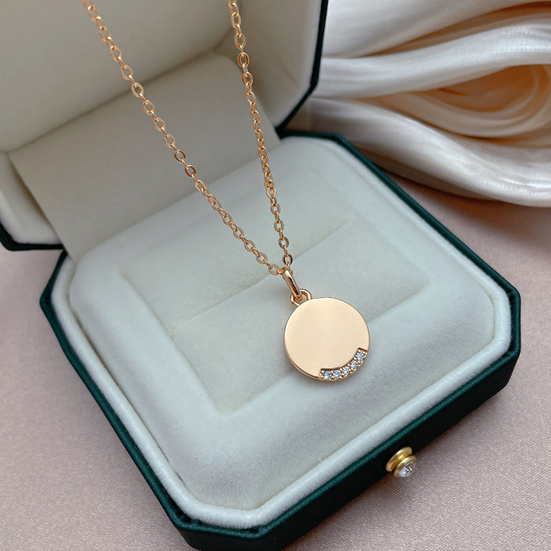Collier disque et zircons, bijou en plaqué or rose et en zircons naturels